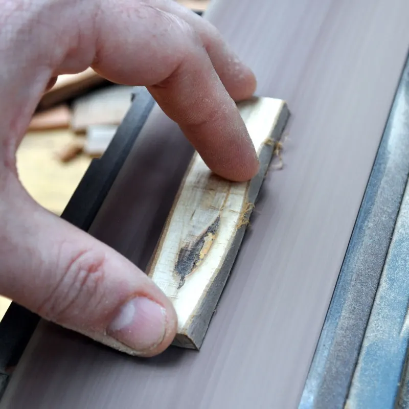 Sanding the wood slice