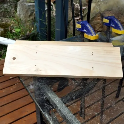 Drill holes in board