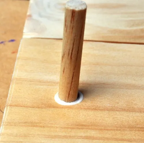 Glue dowel into board