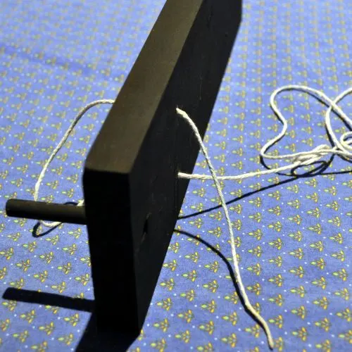 Thread string for hanging vase